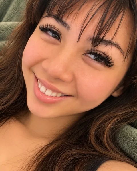 A Sage & Lash client in the lash recliner after her lash extension appointment