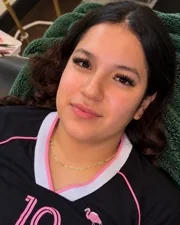 A Sage & Lash client in the lash recliner after her lash extension appointment