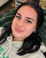 A Sage & Lash client in the lash recliner after her lash extension appointment